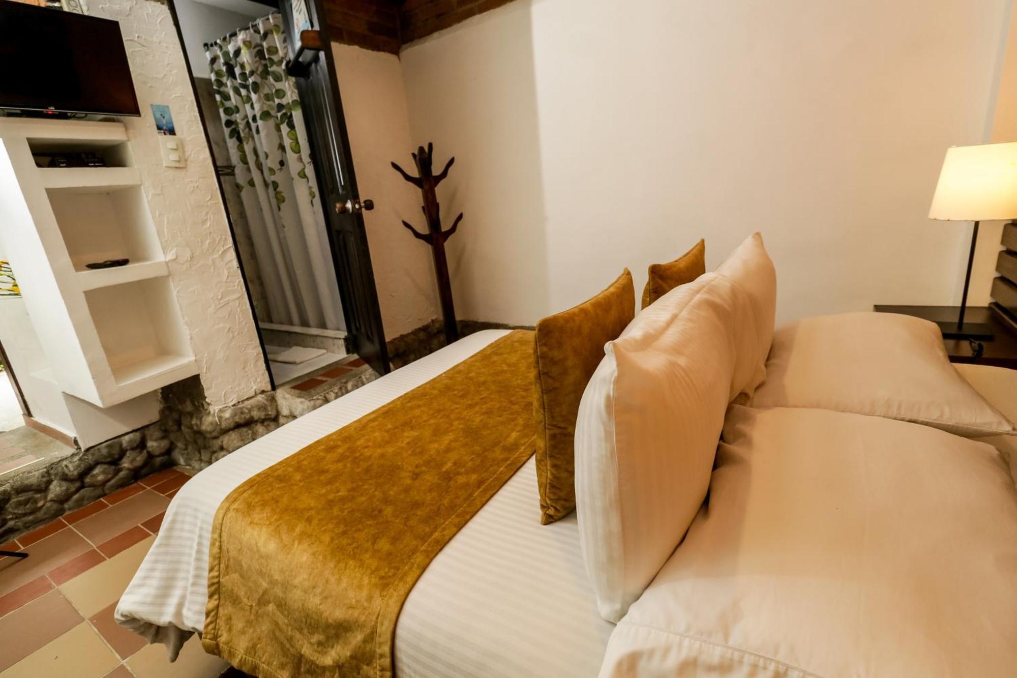 Hotel Visperas Санта-Роса-де-Кабаль Номер фото